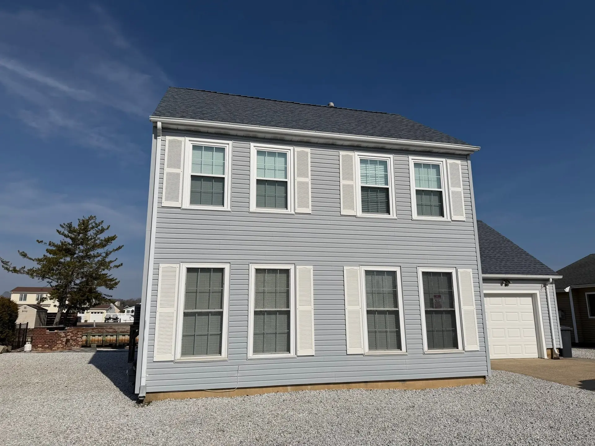 New charcoal architectural shingle roof on a two story home in Ocean County, NJ